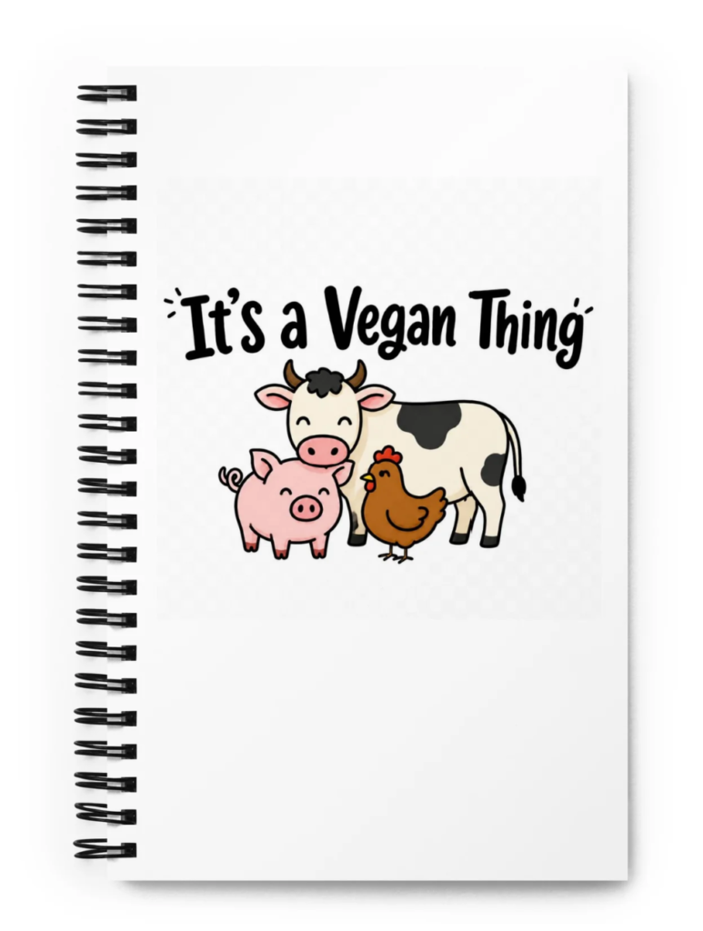 It's a Vegan thing note book featuring a spiral ring binder and motif of a cow pig and chicken